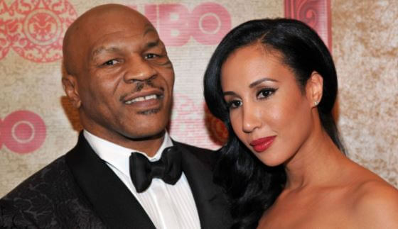 Denise Tyson brother Mike Tyson with his wife Lakiha Spicer at an event.